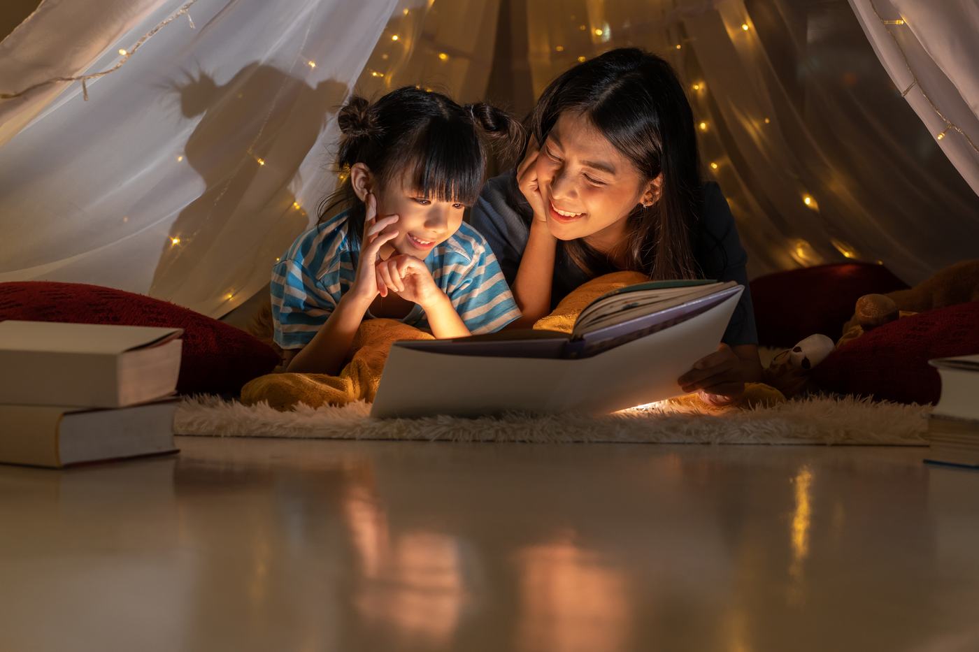 Mother reading with her daughter